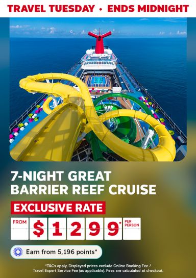yellow and green waterslides on the deck of a Carnival cruise ship featuring a 7-night Great Barrier Reef cruise from $1,299