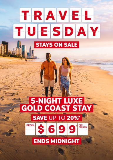Travel Tuesday - stays on sale | 5-night Luxe Gold Coast stay - save up to 20%*. From $699* per person | Ends midnight | Couple walking on the beach at sunset