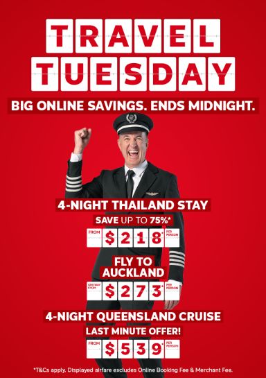 Excited pilot celebrating for Travel Tuesday sale featuring Thailand Auckland flights and Queensland cruise deals from $218