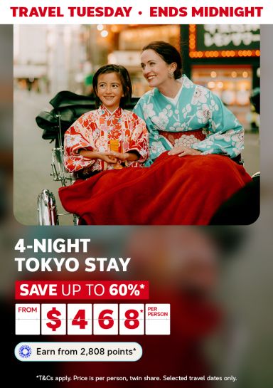Mother and child wearing kimonos, sitting in a rickshaw featuring a 4-night Tokyo stay from $468