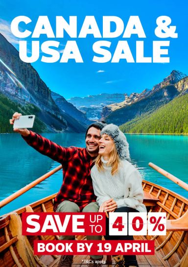 Canada & USA sale - save up t 40%* | Book by 19 April | Couple taking a selfie in Lake Louise in Banff