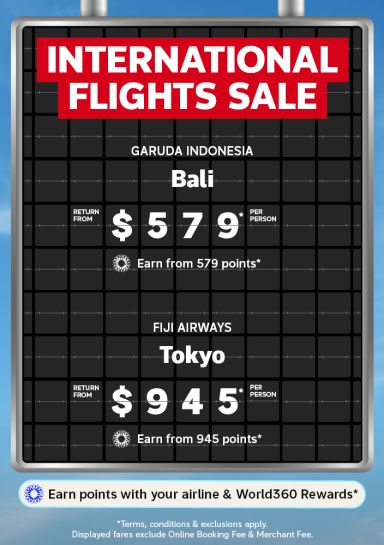 Airport departure board featuring an international Flights Sale with return flights to Bali from $579 and return flights to Tokyo from $945