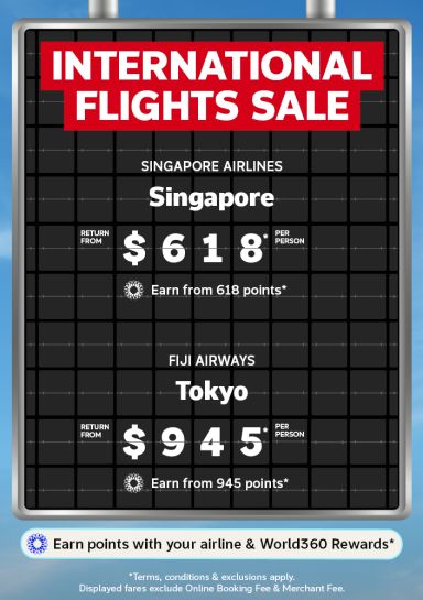 Airport ticker board advertising international flight deals including Singapore return from $618 and Tokyo return from $945