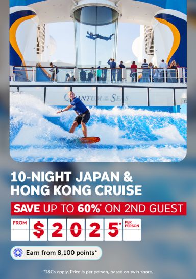 Person surfing a wave simulator on Quantum of the Seas for a 10-night Japan and Hong Kong cruise saving up to 60% on 2nd guest from $2025 per person