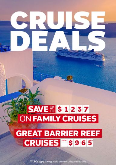 Cruise ship off the coast of Santorini featuring cruise deals like save up to $1237 on family cruises, and Great Barrier Reef cruises from $965