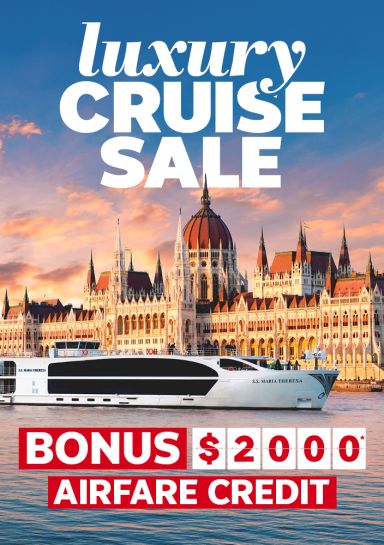 River cruise ship sailing in Hungary featuring a luxury cruise sale with a bonus $2,000* airfare credit