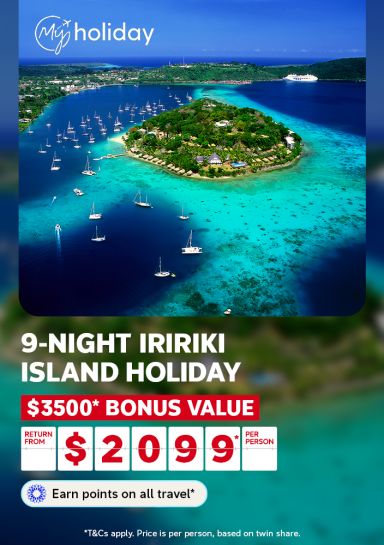 Aerial view of Iririki Island surrounded by turquoise waters and sailboats for a 9-night holiday with $3500 bonus value from $2099 per person