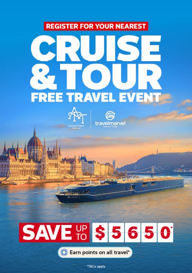 River cruise ship sailing past the Hungarian Parliament Building featuring a cruise & tour free travel event with savings up to $5,650