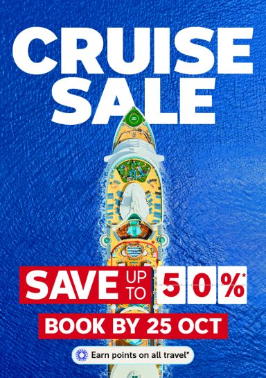 Top down view of a cruise ship at sea featuring a Cruise Sale with savings up to 50%