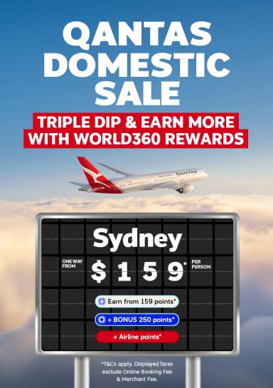 Qantas plane flying through clouds featuring a Qantas domestic sale including one way flights to Sydney from $159, earning more points with World360 rewards