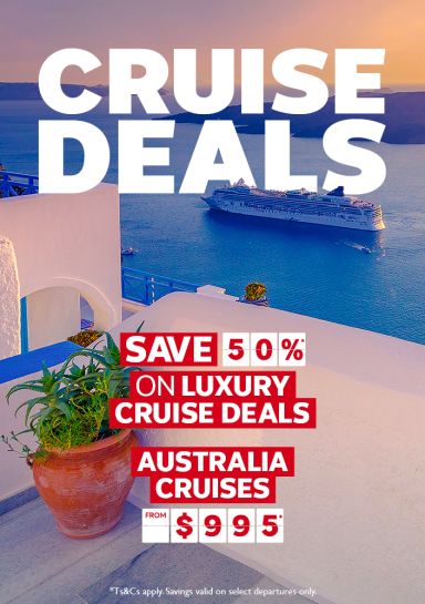Cruise ship sailing past Santorini featuring Cruise Deals including 50% savings on luxury cruises and Australia cruises from $995