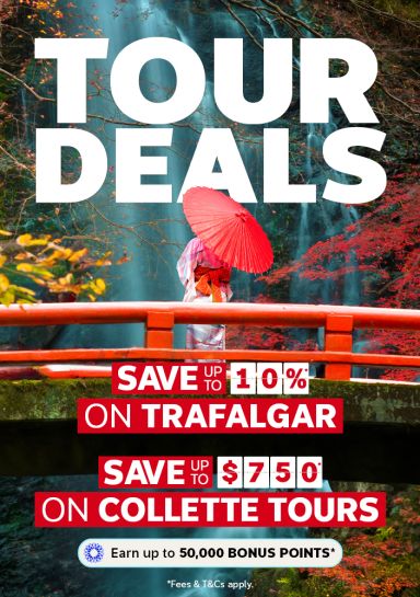 Woman holding a parasol on a red arch bridge looking at a waterfall featuring tour deals including savings up to 10% on Trafalgar and savings up to $750 on Collette Tours