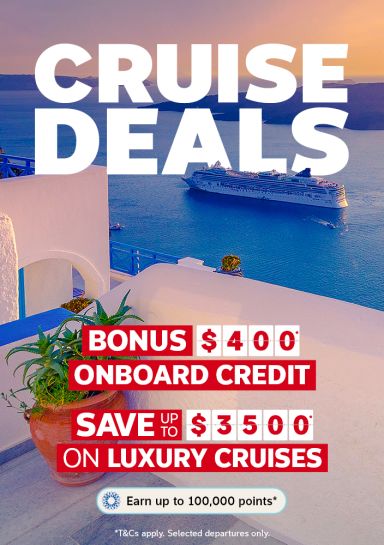 Luxury cruise ship in turquoise Mediterranean waters at sunset for Flight Centre cruise deals offering $400 onboard credit and up to $3500 savings
