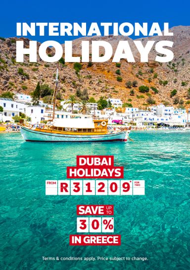 A view of Greek beach and mountain regarding an international holiday package.