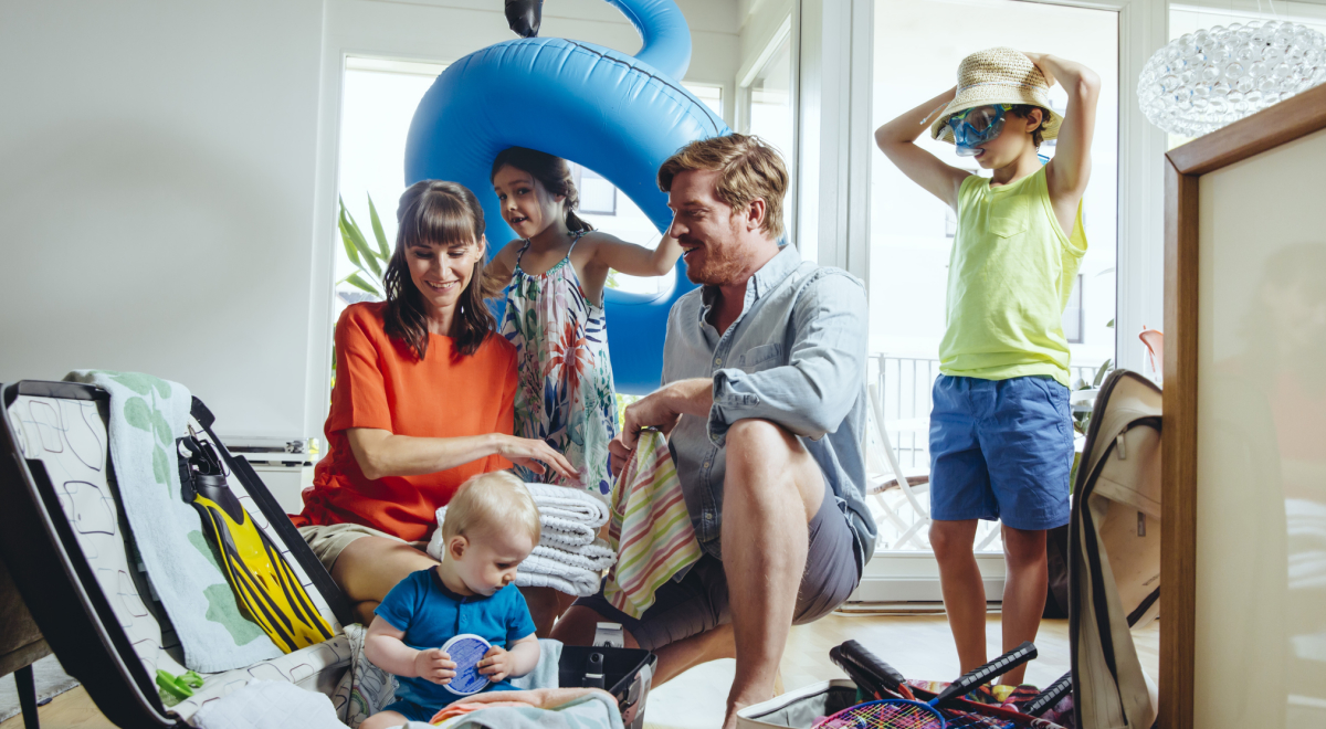 Family packing bags for holiday