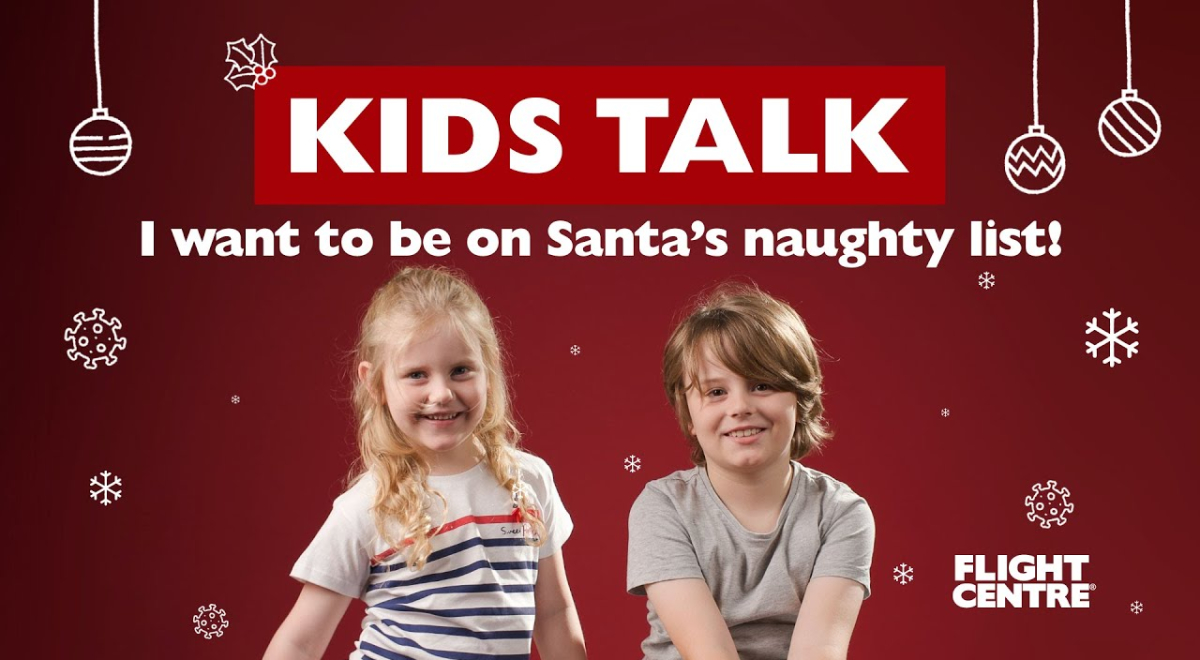 Two kids sitting next to each other with graphic snow falling