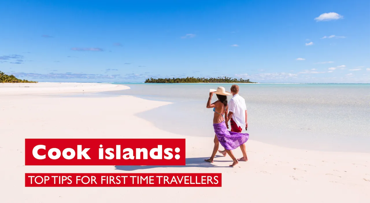 Couple walking on beach in Cook Islands