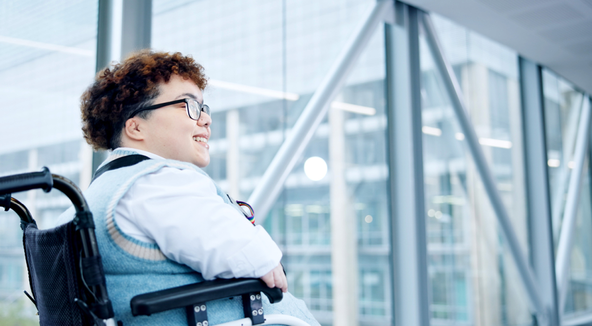 A wheelchair user in an airport