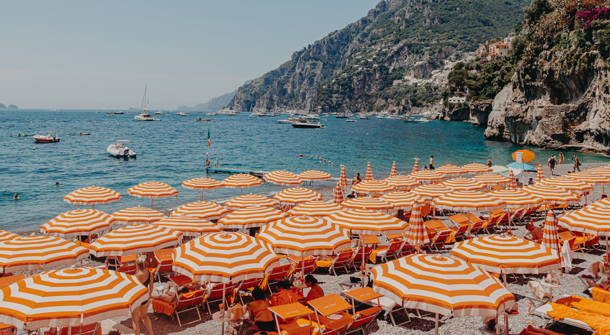Orange and white beach umbrellas in Sicily, Italy