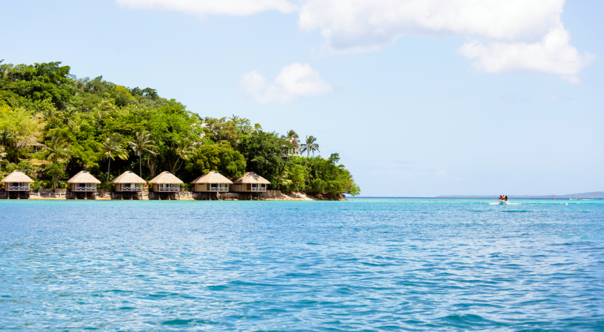 Overwater bungalows at Vanuatu, Iririki Island, view from water