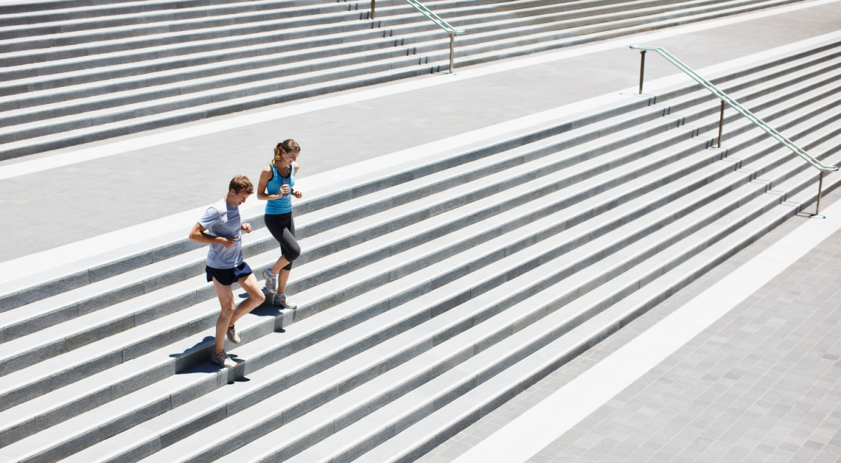 friends running down the stairs in Hobart