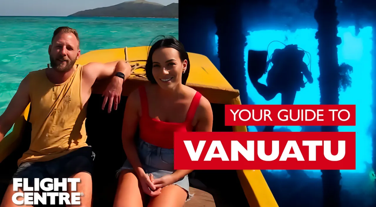 Woman and man sitting on boat next to people snorkeling.