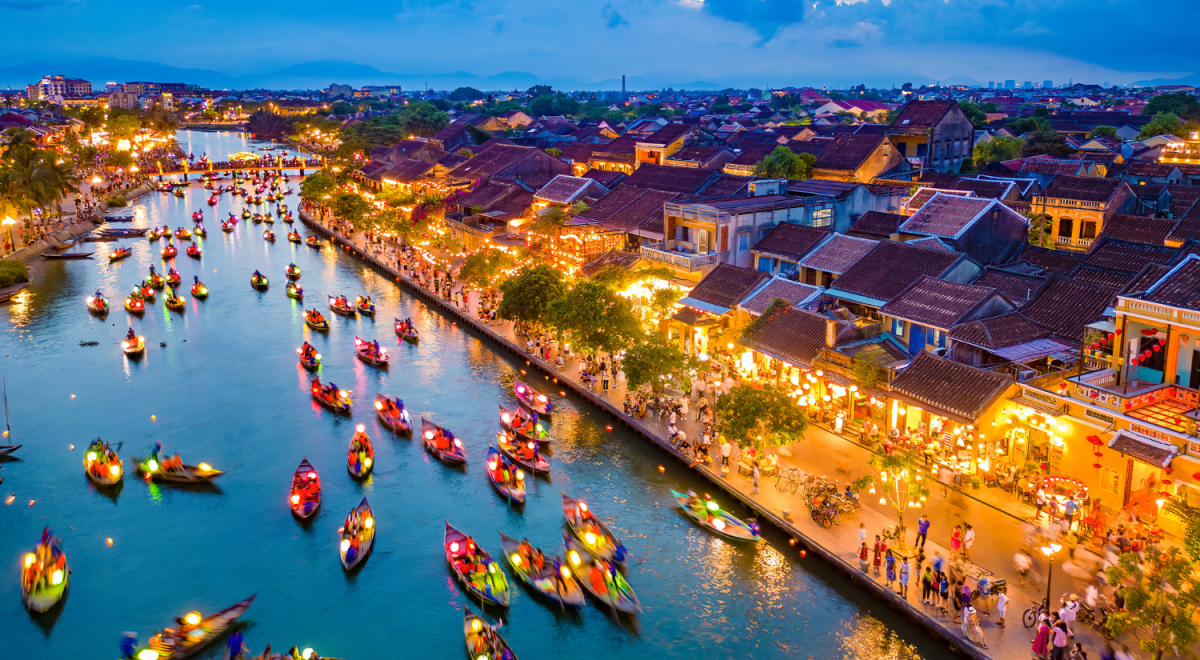 Lantern boats light up the evening in Hoi An, Vietnam