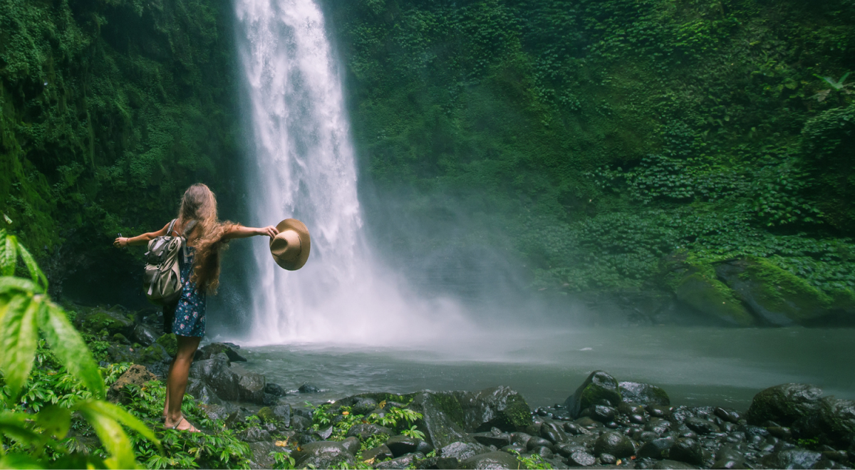 Woman near Nung Nung waterfall on Bali Indonesia
