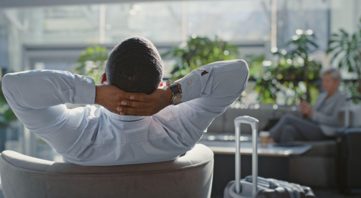 man leaning back in seat