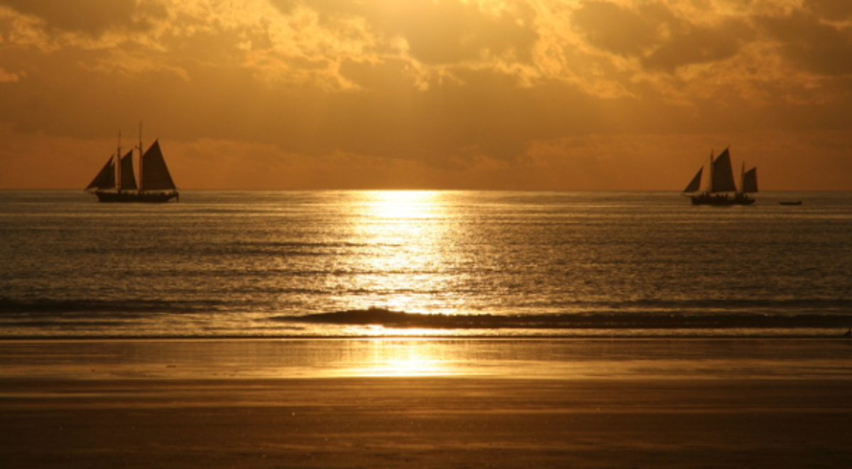 Two sail boats on the water