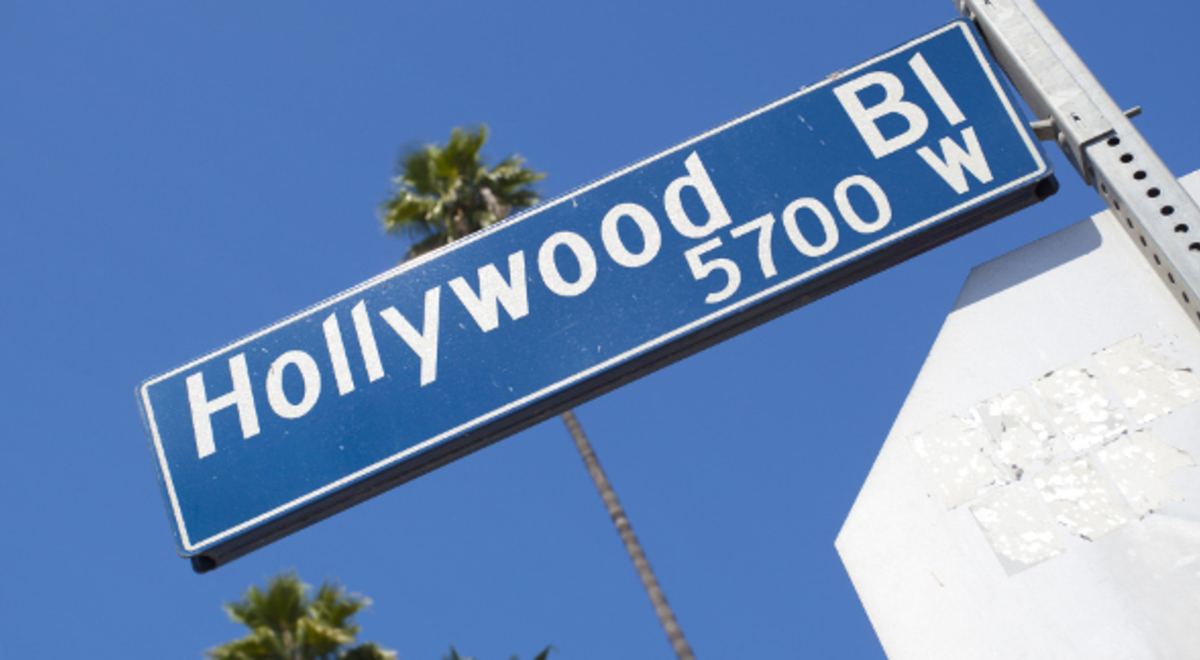 blue wayfinding signage indicating holywood BL