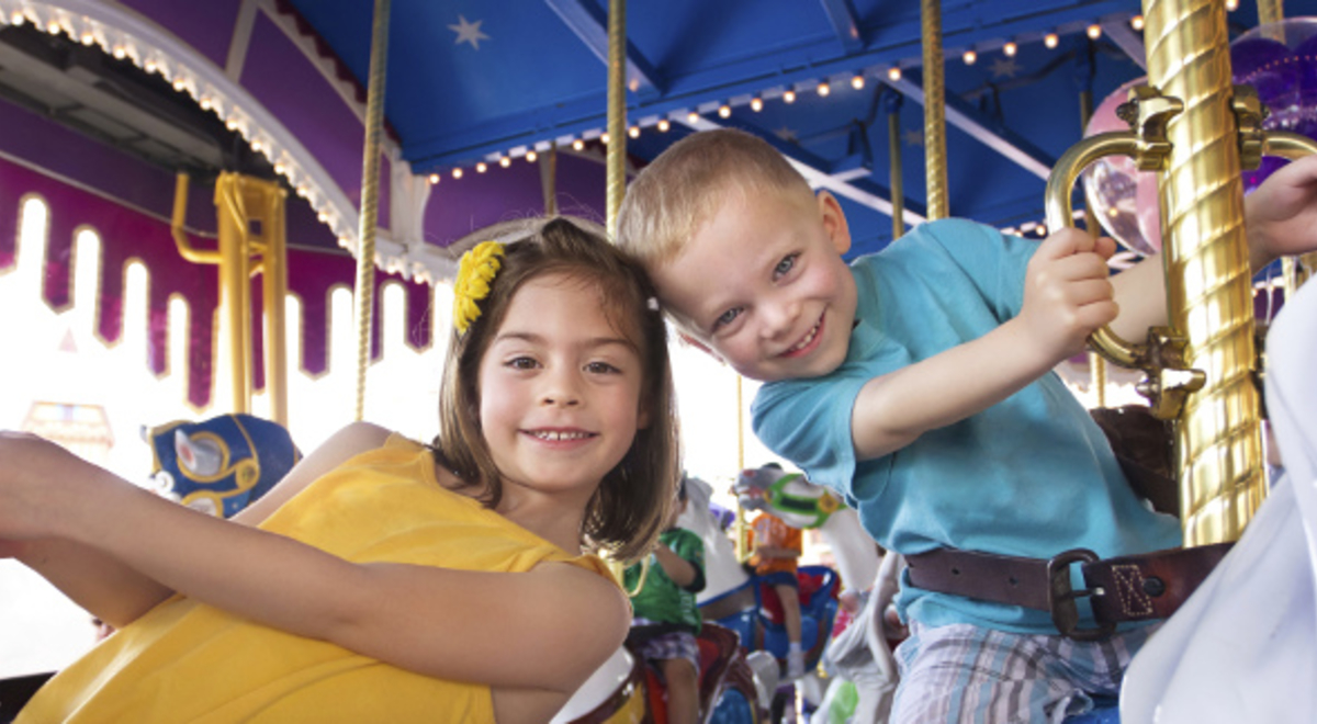 Kids playing on a carousel