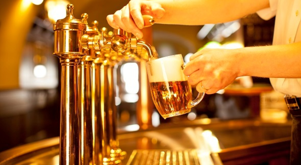 Full glass of beer served directly from the tap