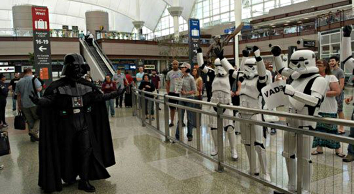 Darth Vada and storm trooper dress up in the airport 