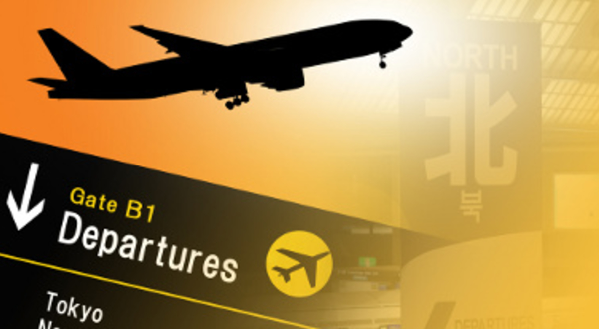 Airport departures board and plane