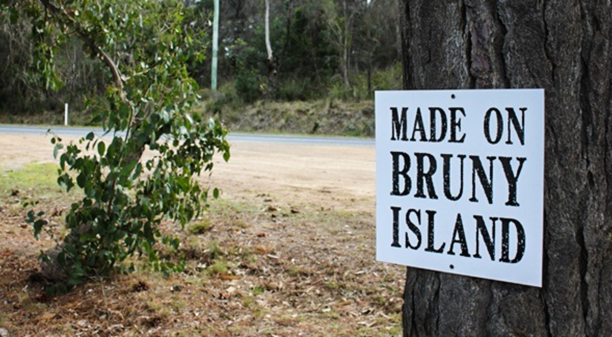 "Made on Bruny Island" signage attached to a tree