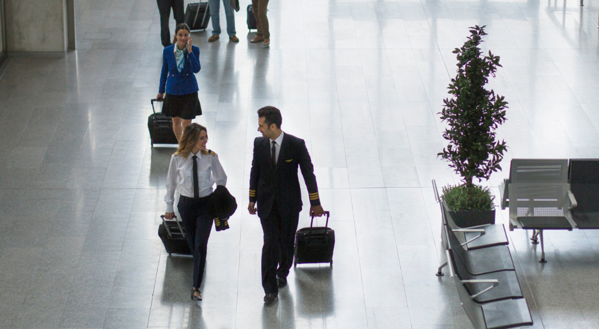People walking through a quiet airport