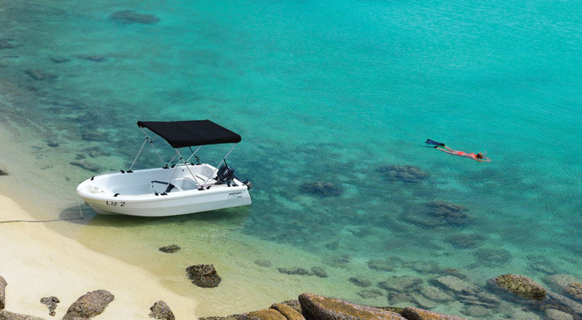 Aerial view of a boat on the coastline 