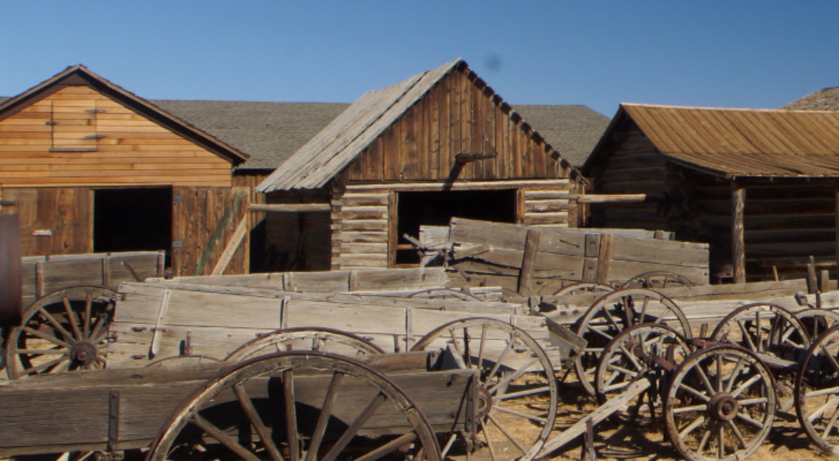Small town with wheelbarrows in front 