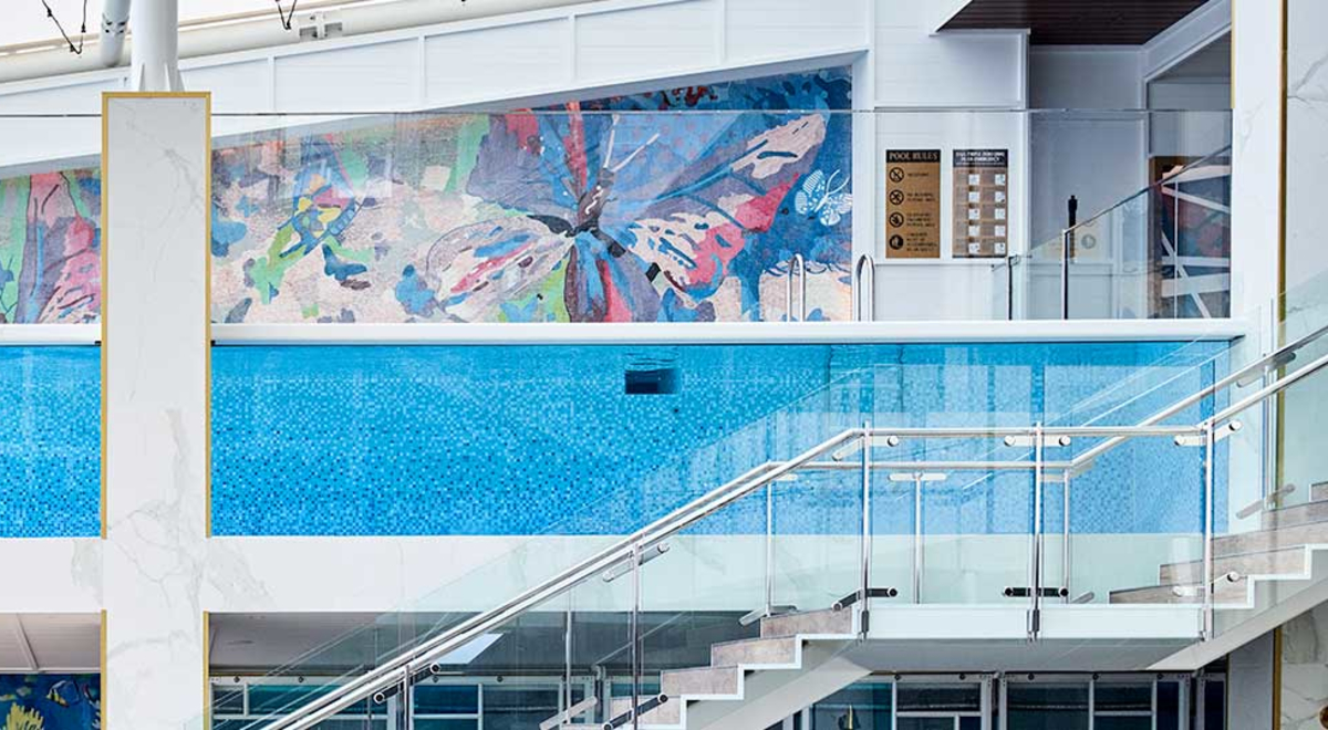 a person swimming though Flynn hotel cairns pool