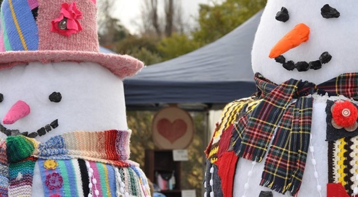  A decorative foam snowman and snowwoman. 