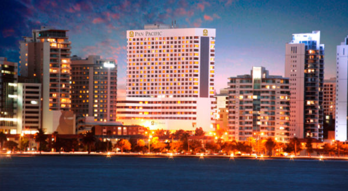 Pan Pacific building and other tall skyscrapers with their magical lights open