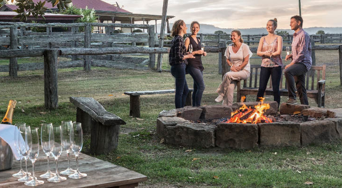 group around fire pit spicers hidden vale