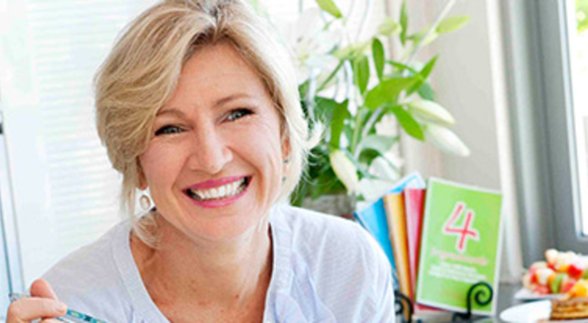 Lady eating and laughing 