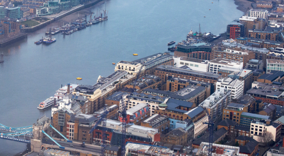 aerial view of the london tower bridge and the two cities it connects