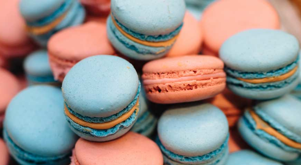 Close-up shot of pink and blue macarons