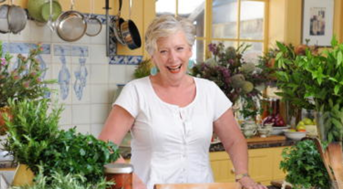 Maggie Beer preparing food in her kitchen