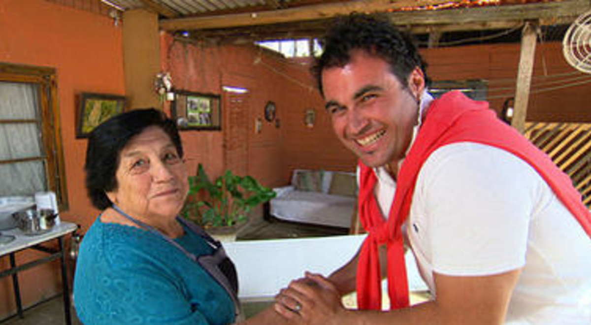 Miguel greeting locals 