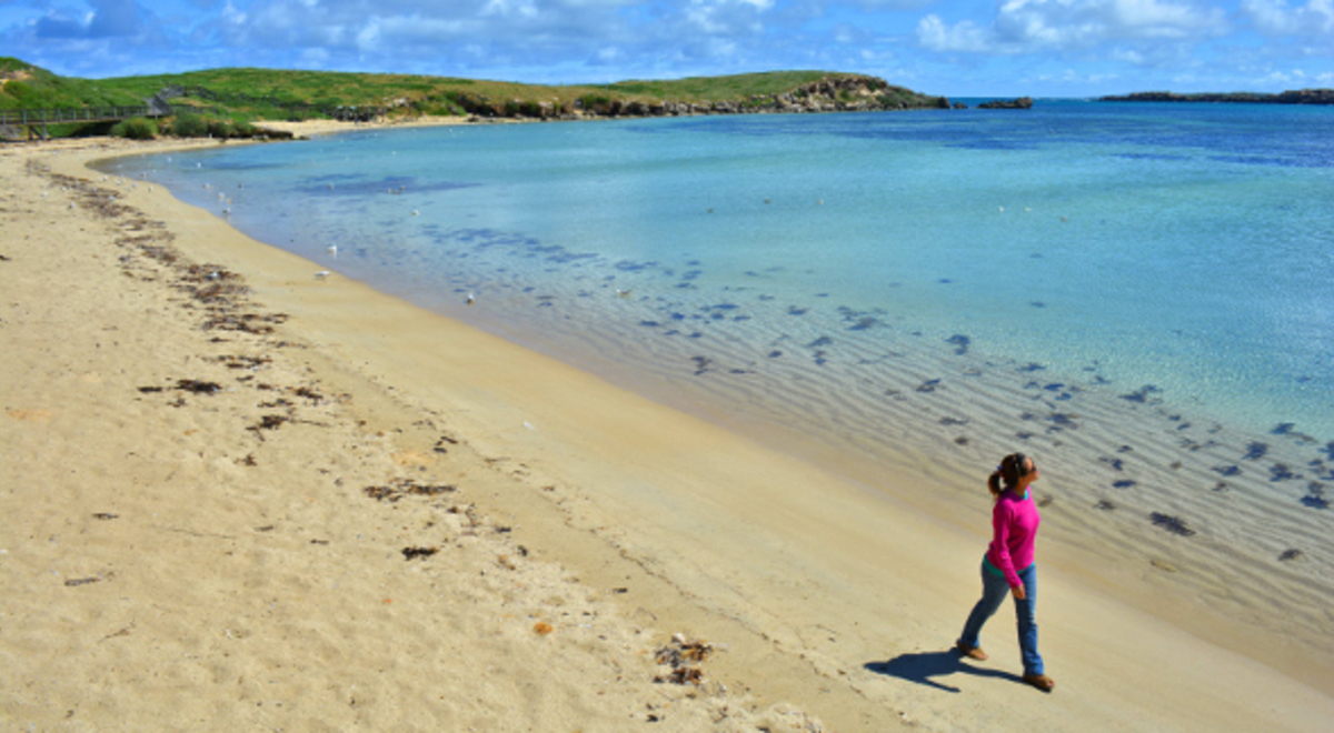 Lady walking around the beach 