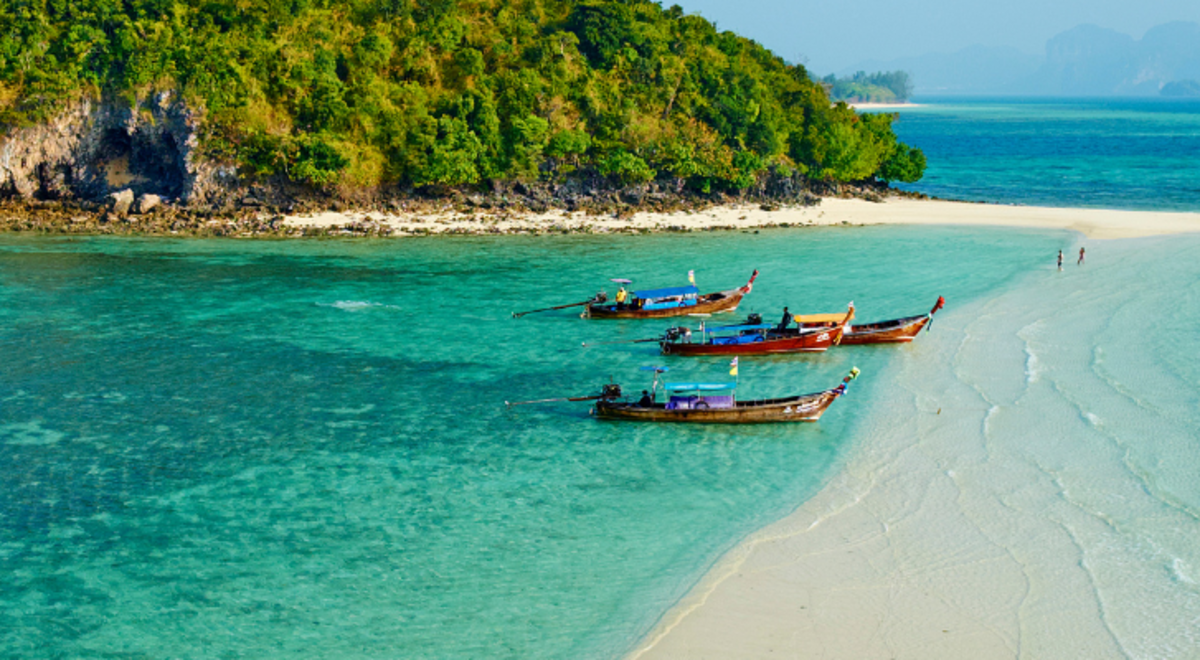 Wooden boat standing by waiting for their guest 